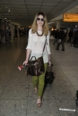 Nicola_Roberts_arrives_at_Heathrow_Airport_20_03_12_28829.jpg