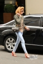 Nicola_leaves_her_hotel_go_shopping_with_her_family_13_03_10_28629.jpg