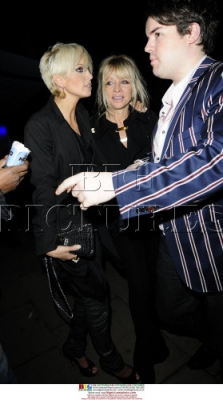 Sarah_Harding_leaving_Mahiki_hand-in-hand_with_Jo_Wood_240209_282429.jpg