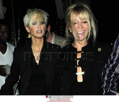 Sarah_Harding_leaving_Mahiki_hand-in-hand_with_Jo_Wood_240209_284729.jpg
