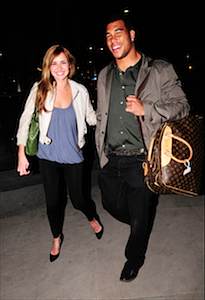 Nadine_Coyle_and_Jason_Bell_Arrive_at_Kings_Cross_in_London_220209_28429.jpg