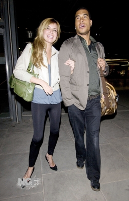 Nadine_Coyle_and_Jason_Bell_Arrive_at_Kings_Cross_in_London_22_02_09_282229.jpg