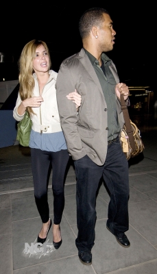 Nadine_Coyle_and_Jason_Bell_Arrive_at_Kings_Cross_in_London_22_02_09_282529.jpg