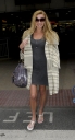 Nadine_Coyle_arrives_at_Heathrow_25_03_2008_28629.jpg