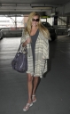Nadine_Coyle_arrives_at_Heathrow_25_03_2008_28729.jpg