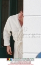 Mystery_man_in_a_white_robe_outside_Nadine_s_front_door_211108_28129.jpg