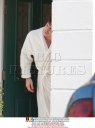 Mystery_man_in_a_white_robe_outside_Nadine_s_front_door_211108_28329.jpg