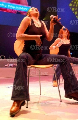 Girls_Aloud_performing_at_Box_Live_Birmingham_290503_55.jpg