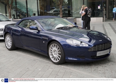 Sarah_Harding_test_driving_an_Aston_Martin_DB9_car_31_05_08_281129.jpg