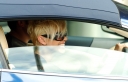 Sarah_Harding_test_driving_an_Aston_Martin_DB9_car_31_05_08_28329.jpg