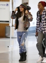 Cheryl_Cole_jokes_for_the_cameras_at_LAX_airport_02_11_12_28929.jpg