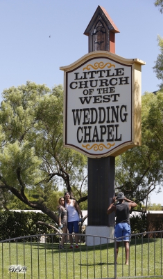 Sarah_and_Mark_seen_looking_around_a_Wedding_Chapel_in_Vegas_08_08_13_28329.jpg