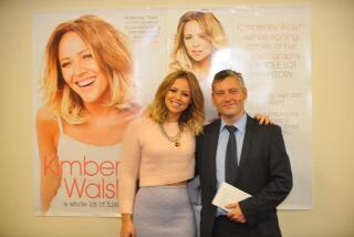 Kimberley_Walsh_at_her_book_signing_at_Morrisons2C_Bradford_25_09_13_283329.jpg