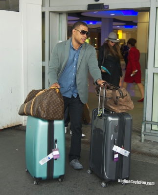 Nadine_Coyle_and_Jason_Bell_at_Heathrow_airport_27_09_13_284129.jpg