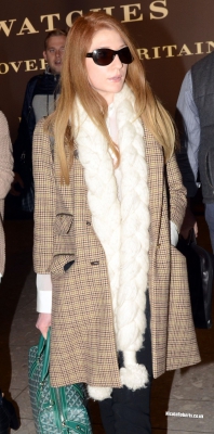 Cheryl_Cole_and_Nicola_Roberts_arrive_back_at_Heathrow_airport_06_10_13_286829.jpg