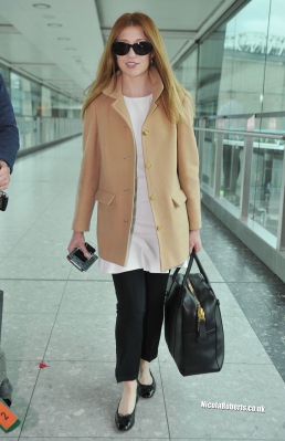 Nicola_Roberts_lands_at_Heathrow_airport_from_LA_05_11_13_28329.jpg