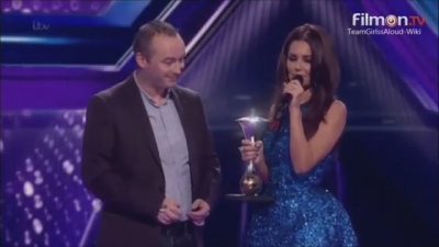 Cheryl_-_Presenting_and_award_at_The_Sun_Military_Awards_-_18-12-2014_mp40059.jpg
