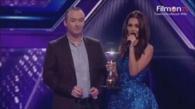Cheryl_-_Presenting_and_award_at_The_Sun_Military_Awards_-_18-12-2014_mp40060.jpg
