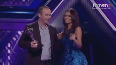 Cheryl_-_Presenting_and_award_at_The_Sun_Military_Awards_-_18-12-2014_mp40068.jpg