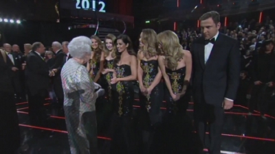 Queen_meets_One_Direction_and_Girls_Aloud_at_The_Royal_Variety_Performance_mp40134.jpg