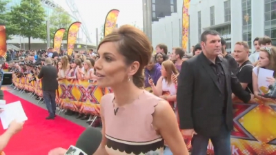 CHERYL-__New_tattoo__and_fellow_X_Factor_judges_mp40000.jpg