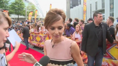 CHERYL-__New_tattoo__and_fellow_X_Factor_judges_mp40002.jpg