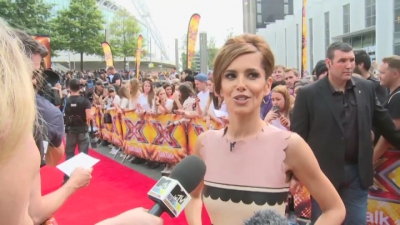 CHERYL-__New_tattoo__and_fellow_X_Factor_judges_mp40006.jpg