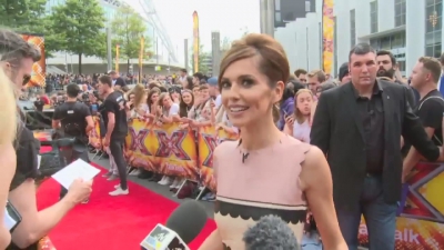 CHERYL-__New_tattoo__and_fellow_X_Factor_judges_mp40014.jpg
