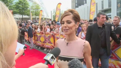 CHERYL-__New_tattoo__and_fellow_X_Factor_judges_mp40017.jpg