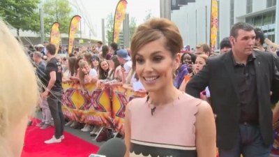 CHERYL-__New_tattoo__and_fellow_X_Factor_judges_mp40022.jpg