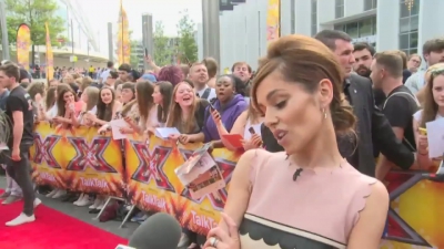 CHERYL-__New_tattoo__and_fellow_X_Factor_judges_mp40029.jpg