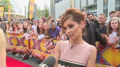 CHERYL-__New_tattoo__and_fellow_X_Factor_judges_mp40035.jpg