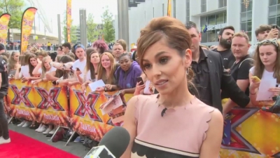 CHERYL-__New_tattoo__and_fellow_X_Factor_judges_mp40037.jpg