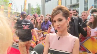 CHERYL-__New_tattoo__and_fellow_X_Factor_judges_mp40045.jpg