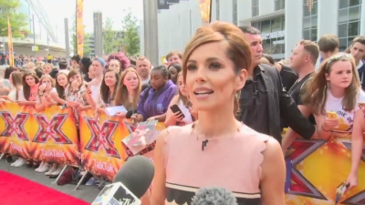 CHERYL-__New_tattoo__and_fellow_X_Factor_judges_mp40053.jpg