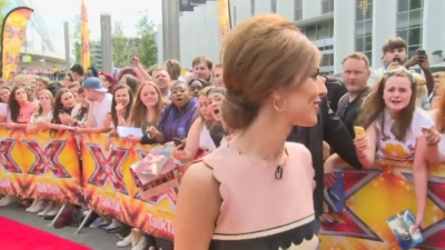 CHERYL-__New_tattoo__and_fellow_X_Factor_judges_mp40063.jpg