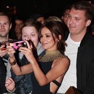 Cheryl_Fernandez-Versini_displays_her_very_slim_physique_and_a_hint_of_sideboob_in_a_sophisticated_black_jumpsuit_at_perfume_launch_19_08_15_283129.jpg