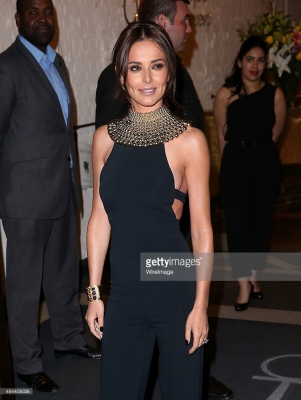 Cheryl_Fernandez-Versini_displays_her_very_slim_physique_and_a_hint_of_sideboob_in_a_sophisticated_black_jumpsuit_at_perfume_launch_19_08_15_284729.jpg
