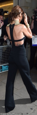Cheryl_Fernandez-Versini_displays_her_very_slim_physique_and_a_hint_of_sideboob_in_a_sophisticated_black_jumpsuit_at_perfume_launch_19_08_15_28929.jpg
