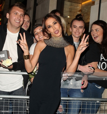 Cheryl_Fernandez-Versini_displays_her_very_slim_physique_and_a_hint_of_sideboob_in_a_sophisticated_black_jumpsuit_at_perfume_launch_19_08_15_289329.jpg