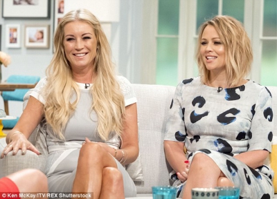 Kimberley_Walsh_and_Denise_van_Outen_arrived_at_London_s_ITV_studios_on_Thursday_morning_s_to_talk_about_their_new_play_Sweet_Charity_10_08_15_28629.jpg