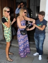 Kimberley_Walsh_opted_for_a_colourful_gypsy_print_bandeau_jumpsuit_and_was_pictured_exiting_a_car_outside_of_the_theatre_minutes_after_Denise_s_arrival_21_08_15_28229.jpg