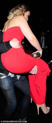 Kimberley_Walsh_sizzles_in_a_red_strapless_dress_as_she_attends_festive_themed_Elf_The_Musical_after-party_05_11_15_281829.jpg