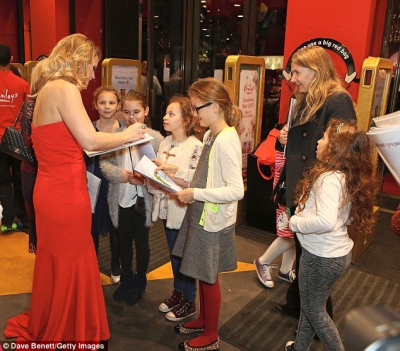 Kimberley_Walsh_sizzles_in_a_red_strapless_dress_as_she_attends_festive_themed_Elf_The_Musical_after-party_05_11_15_28829.jpg