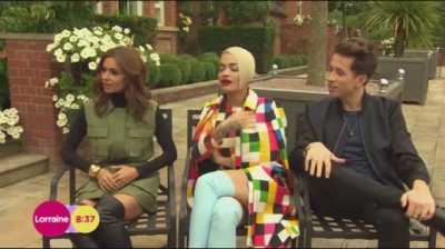 WATCH_Cheryl_Fernandez_Versini2C_Rita_Ora_and_Nick_Grimshaw_laugh_off_announcer_Pete_Dickson_quitting_mp40005.jpg