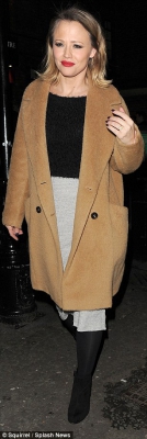 Kimberley_Walsh_highlights_her_hourglass_curves_in_a_form-fitting_pencil_skirt_and_cropped_jumper_as_she_leaves_the_theatre_01_12_15_28729.jpg