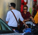 Kimberley_Walsh_and_her_fianc25E9_Justin_Scott_dote_on_cute_son_Bobby_as_they_arrive_in_Barbados_ahead_of_their_wedding_25_01_16_28729.jpg