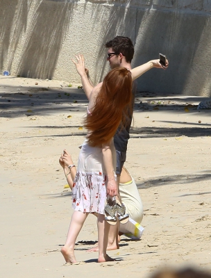 Nicola_Roberts_bares_her_perfect_porcelain_skin_and_toned_abs_in_a_pink_bikini_as_she_hits_the_beach_in_Barbados_29_01_16_285929.jpg