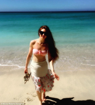 Nicola_Roberts_bares_her_perfect_porcelain_skin_and_toned_abs_in_a_pink_bikini_as_she_hits_the_beach_in_Barbados_29_01_16_28829.jpg