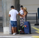 Kimberley_Walsh_and_Justin_Scott_looked_more_smitten_with_their_little_family_than_ever_as_they_headed_home_from_their_honeymoon_in_Barbados_12_02_16_281729.jpg